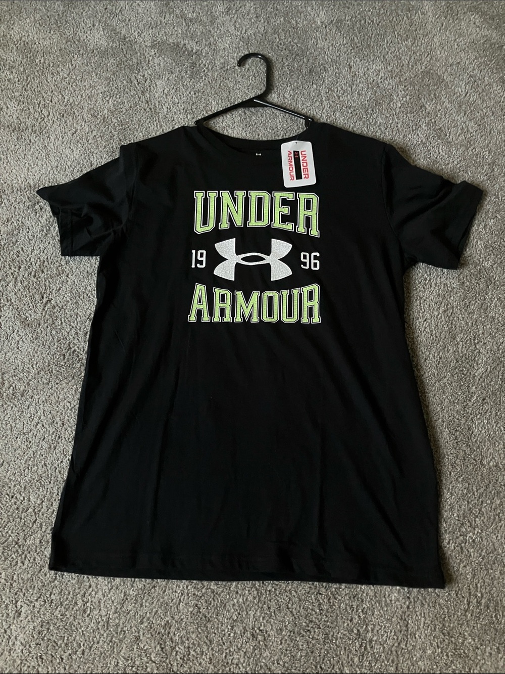 Under Armour Short-Sleeve Logo is a Neon Green Accents size youth extra large